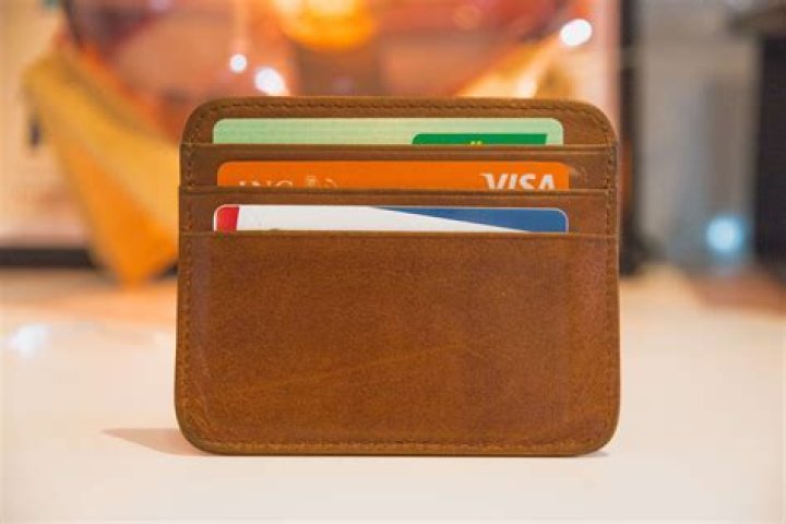 Can a company take money from a Cancelled debit card?