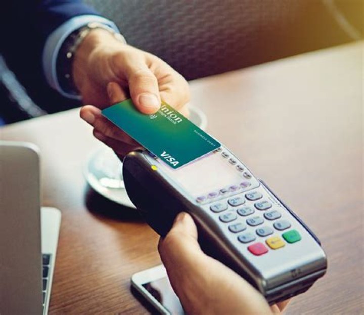 How can I pay my credit card bill with a credit card?