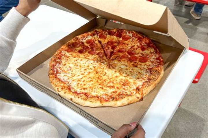 How much did a pizza cost in 2003?