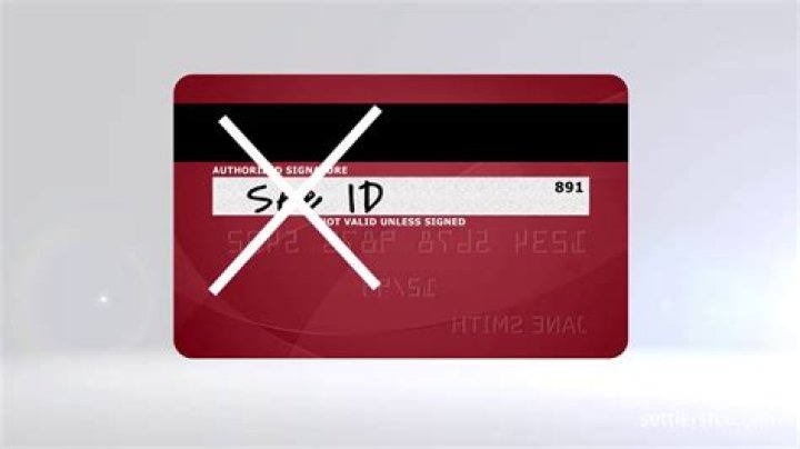 Should you sign the back of your debit card?