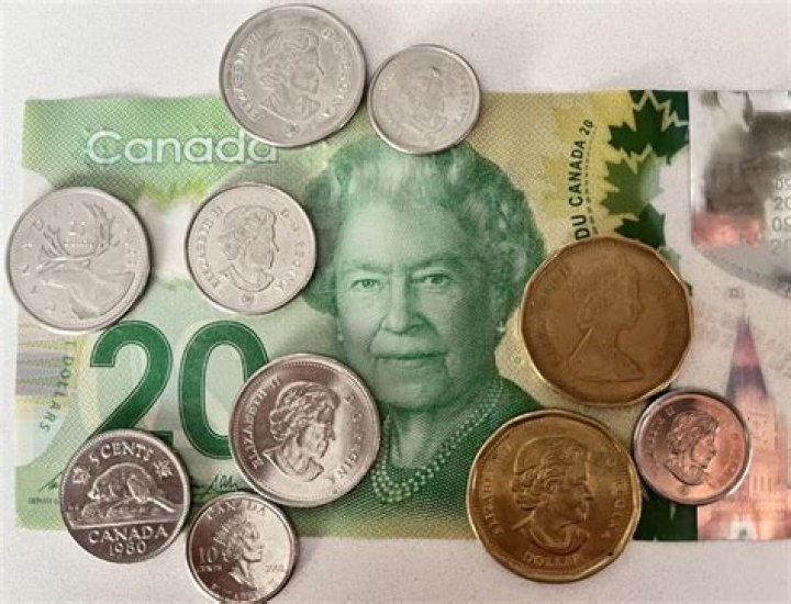 What is $100 Canadian in British pounds?